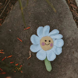 PEBBLE DAISY RATTLE